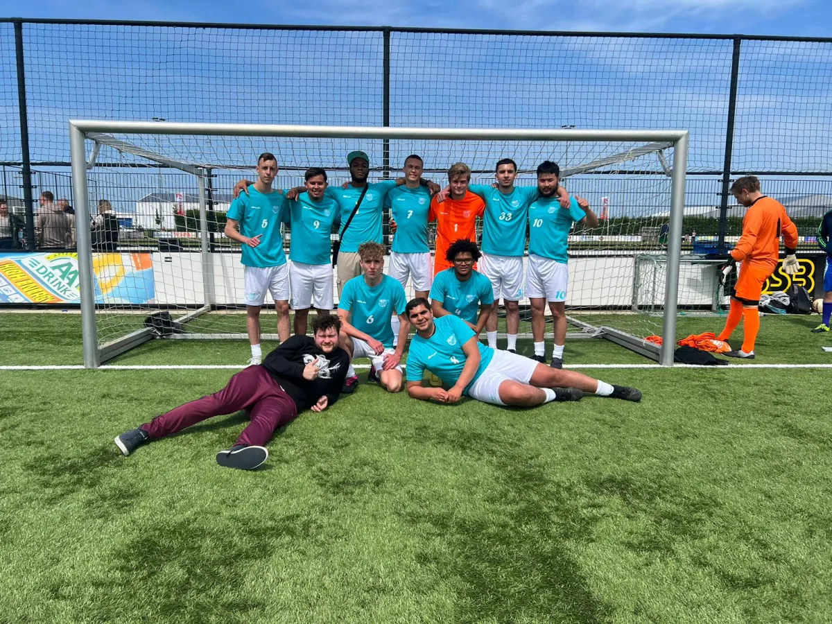 Football team wearing printed shirts and shorts by Custom Operations